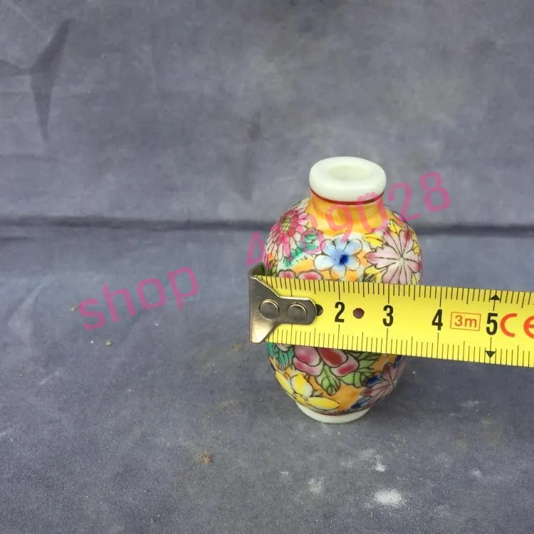 

Qing Dynasty Yong Zheng produced, hand painted enamel, oval snuff bottle.