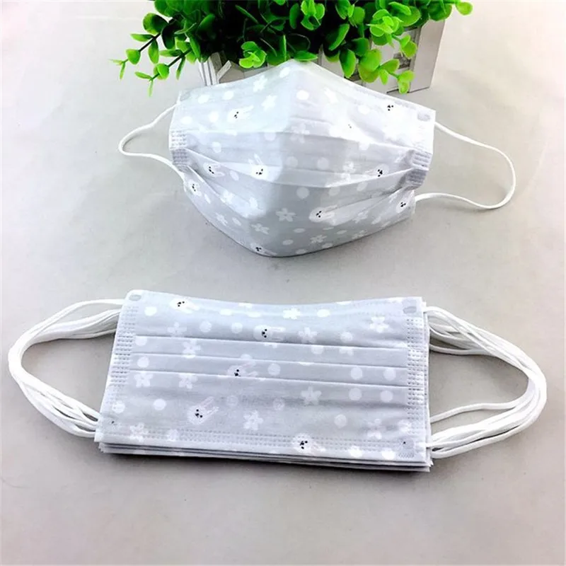 17 10PCS Anti-dust Windproof Disposable Mouth Mask Cute Cartoon Non-woven 3 Layers Anti Haze Adult Printed Masks - Цвет: 17