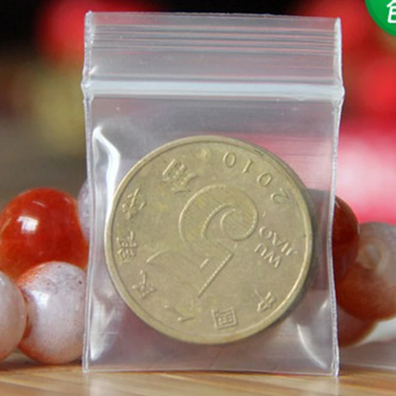 

Plastic Packing Bags !100pcs/lot (2.2cm*2.5cm) Clear Resealable Plastic Bag PE Zip Lock Pouches thickness:0.2mm