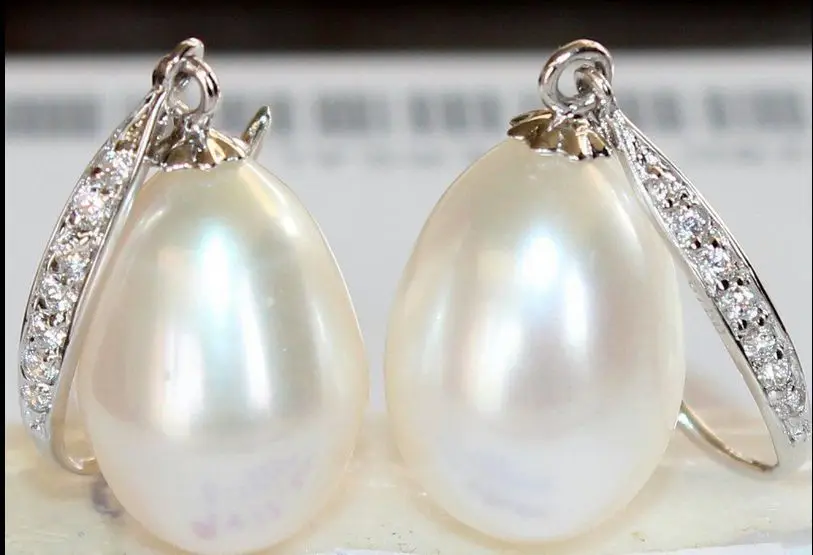 

Free shipping 2015 new a pair of natural 11-13MM Australian south seas white pearl earrings