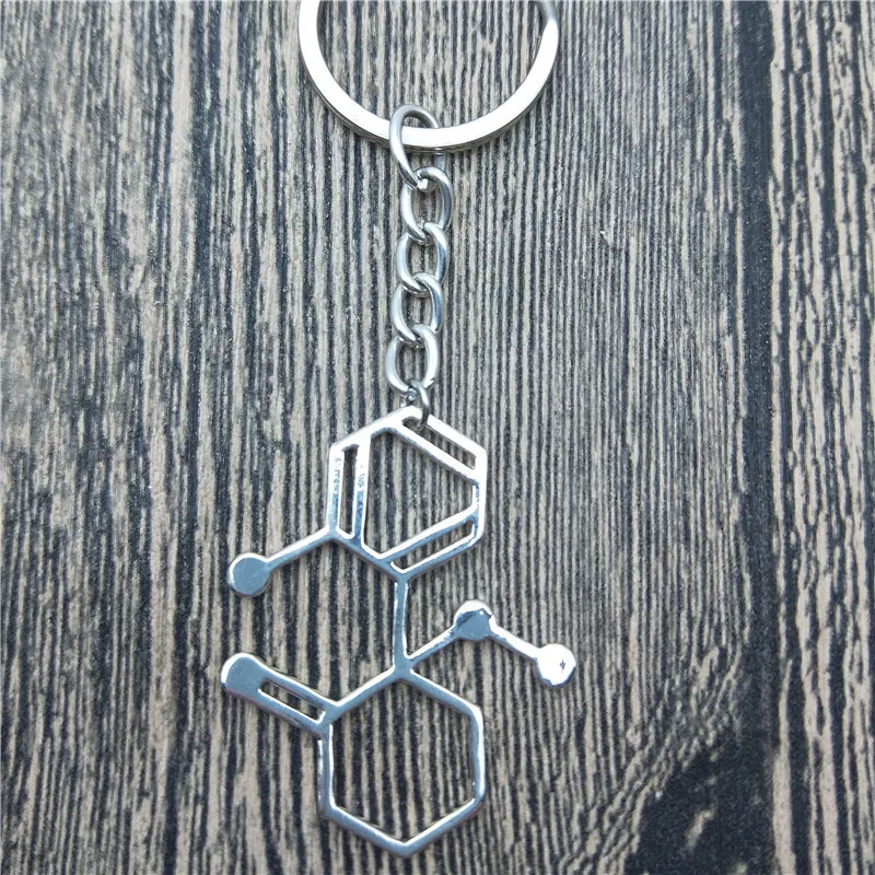 Маленький брелок молекулы брелки в прямоугольной многополярной нейроне