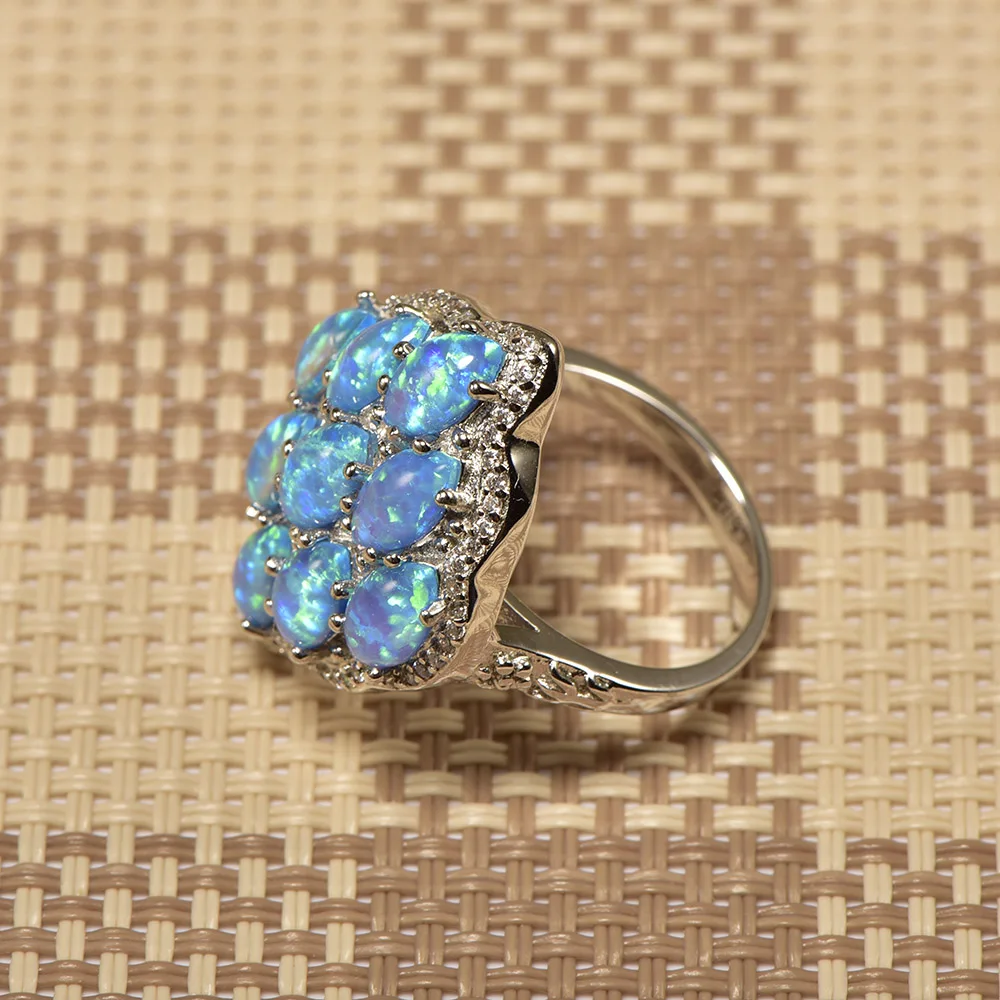 Кольцо Weinuo синее огненное Опаловое с белым кристаллом из серебра 925 пробы высокое