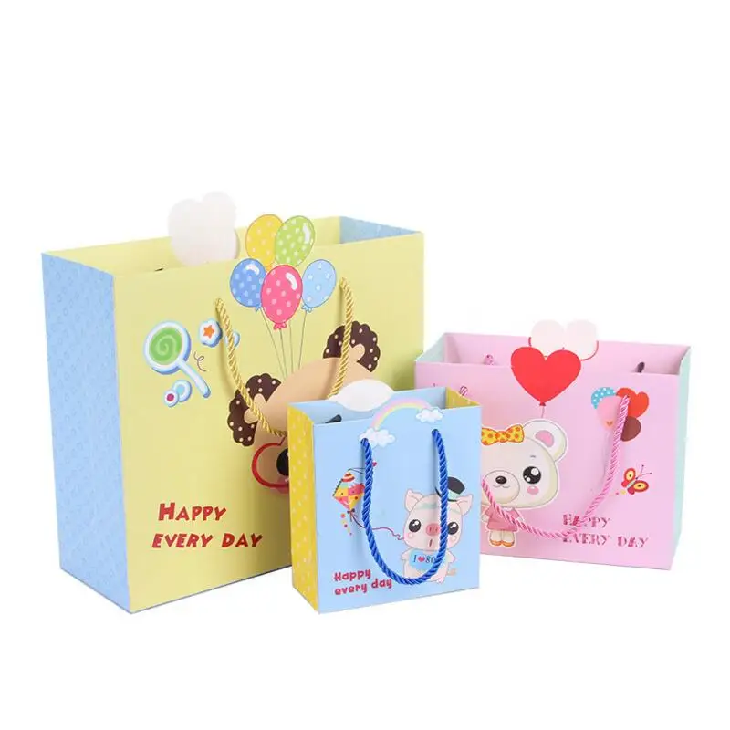 

10pcs/lot Creative Cartoon Print Paper Gift Wrapping Bag Children's Day Birthday Gift Bag 14x15x7cm
