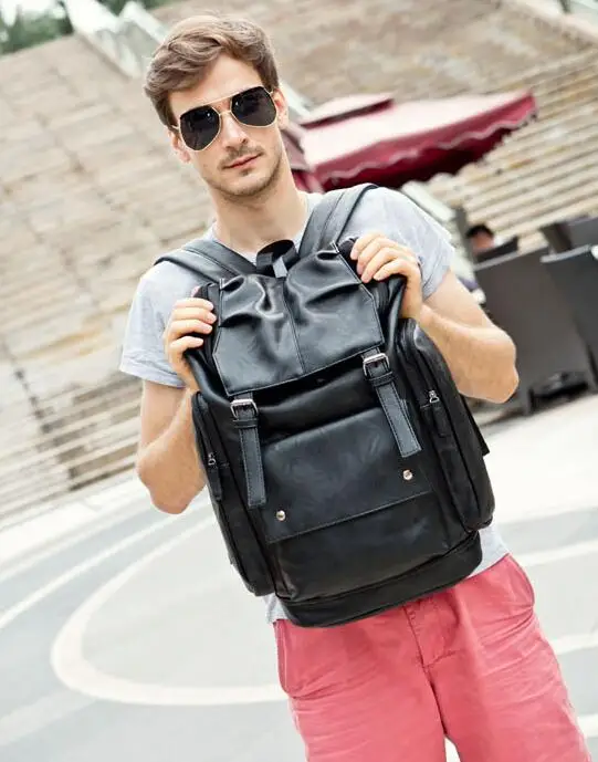 Мужской кожаный рюкзак от известного бренда черный большой дорожный для