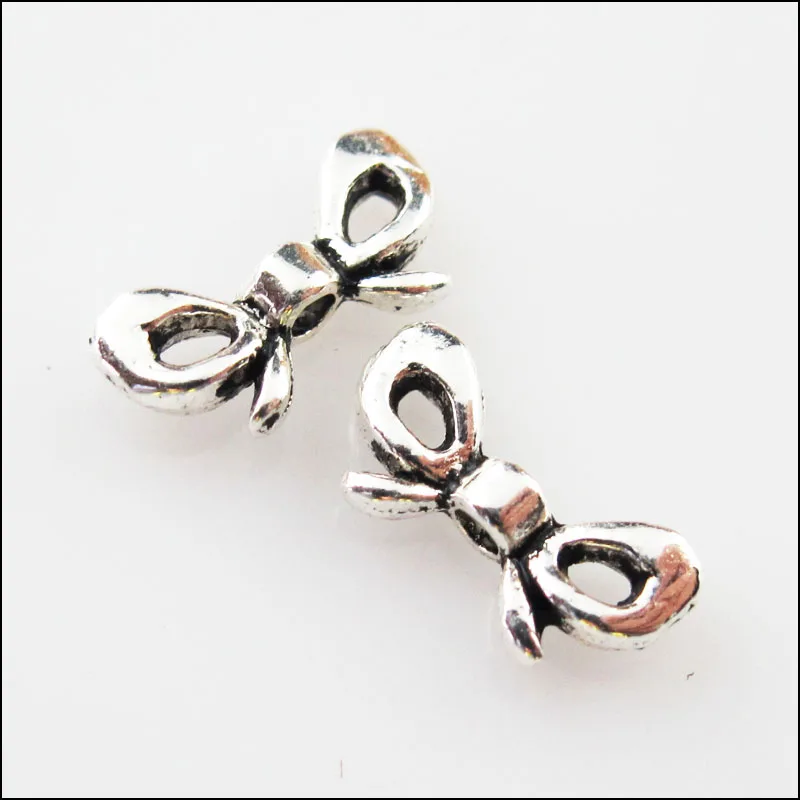 

70Pcs Tibetan Silver Color Butterfly Knot Spacer Beads Charms 6x12mm