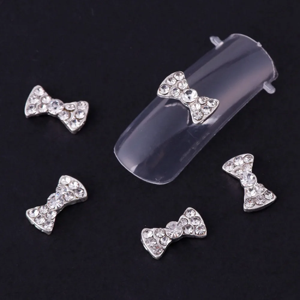 10 шт. серебро красочные бантом ногтей Шарм 3D Сплав Блеск Стразы Nail Книги по