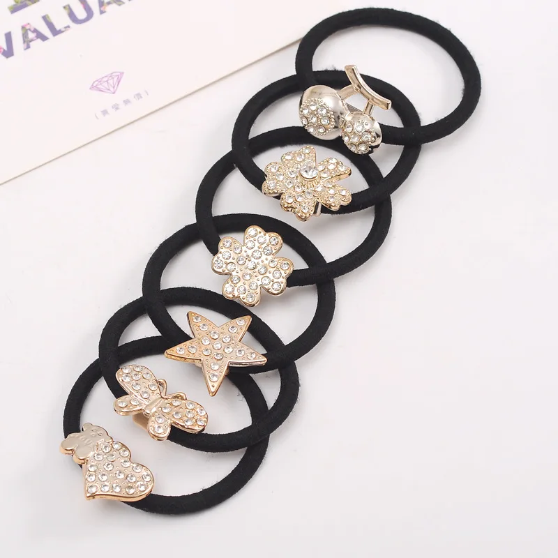 Женская резинка для волос 4 шт. черная с бриллиантами и бантом в виде цветов