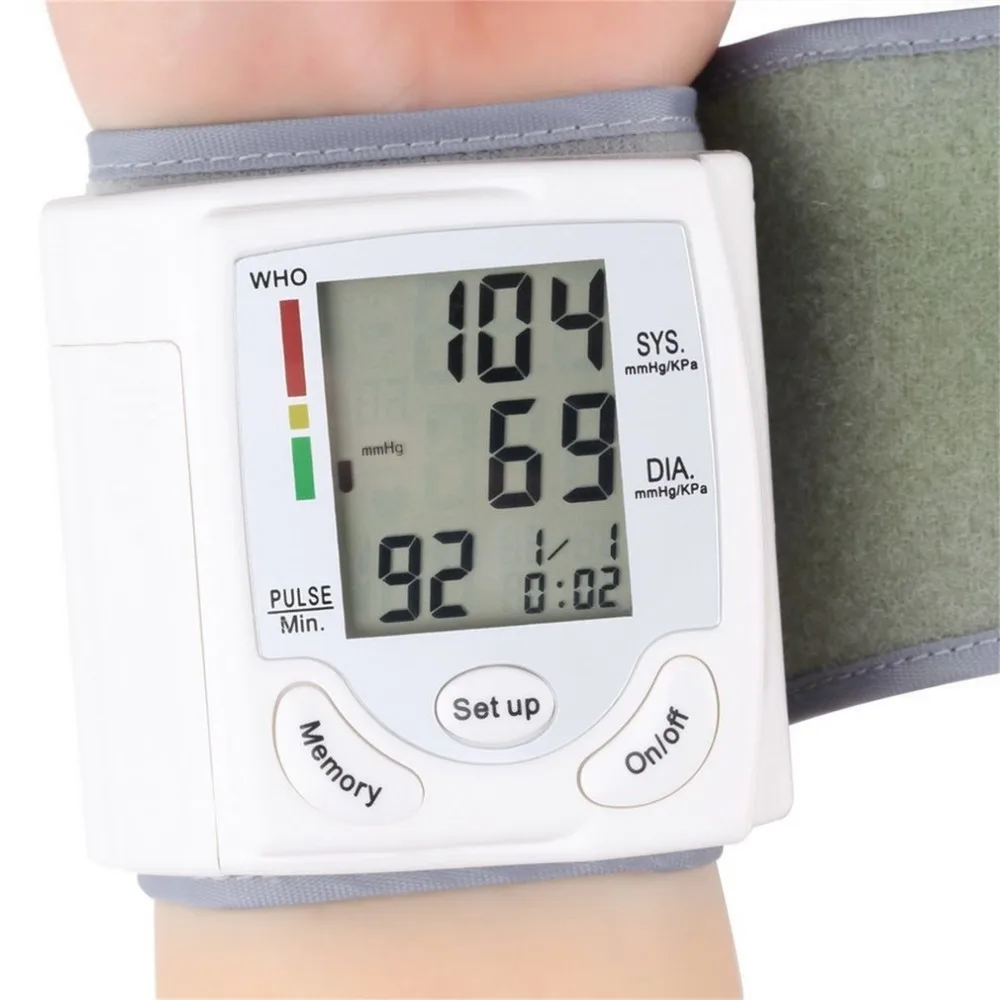 

Automatic Digital LCD Display Wrist Blood Pressure Monitor Device Heart Beat Rate Pulse Meter Measure Tonometer White hot