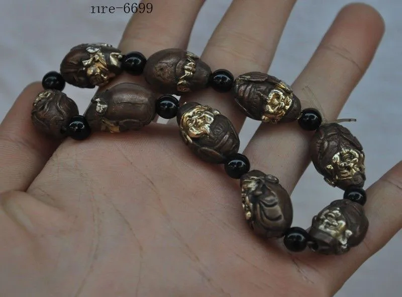 

Christmas Wealth God Mammon statue Bracelet bangle wristlet circlet wristband Halloween