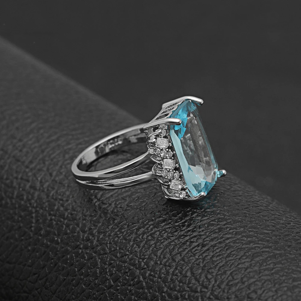 Женские кольца с цирконием Hainon большие квадратные небесно-голубого цвета