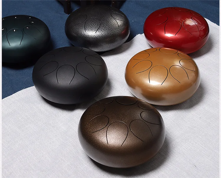 

Цистерна Handpan Tank со стальным язычком, 12 дюймов, 8 заметок, подушка + 2 молотка