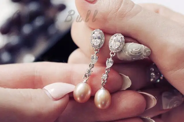 Серьги-подвески из серебра 925 пробы с натуральным пресноводным жемчугом |