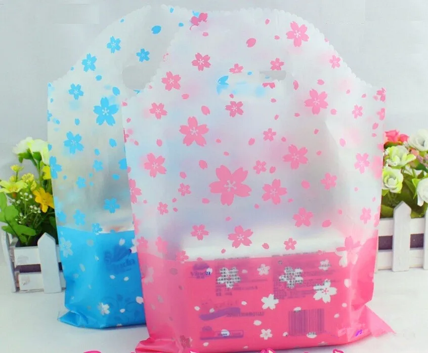 

flower blue shopping plastic gift bags with handle/ pink plastic bags for gifts