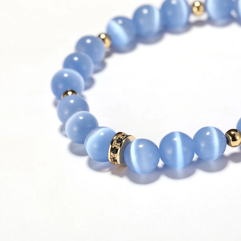 Женский браслет с камнем кошачий глаз роскошный бусинами из циркония голубым