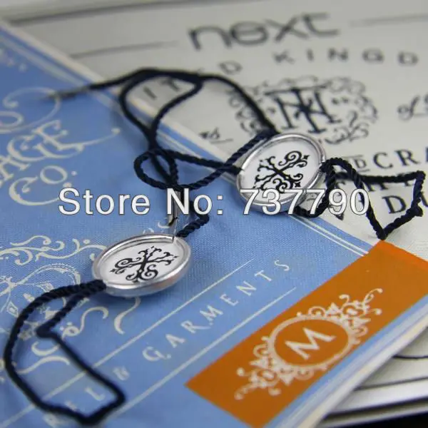 

dia.15mm/custom clothes metal seal hang tag /free shipping/string hang tag/plastic tag