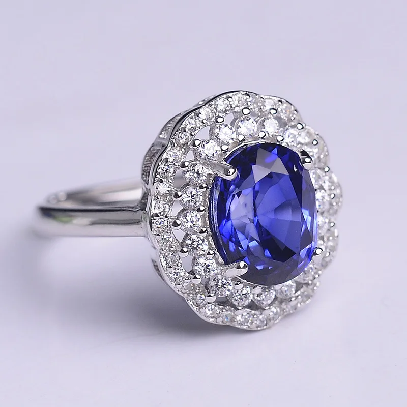 Модный дизайн имитации естественного голубого кристалла цветной подвесной кольцо роскошно инкрустированное камнем для женской ювелирной свадебной коллекции.