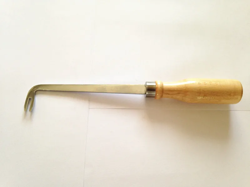 

The piano tuning tool nailed wrench with wooden handle