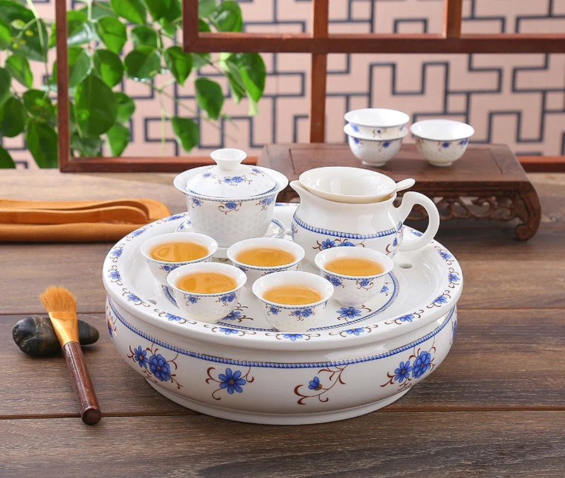 11-частный набор костяной фарфоровой чайной кружки и чайника в стиле кунг-фу с подносом винтажного китайского стиля.