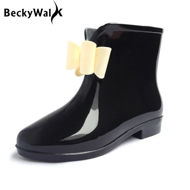 Женские резиновые сапоги с бантом на плоской подошве цветочным принтом для