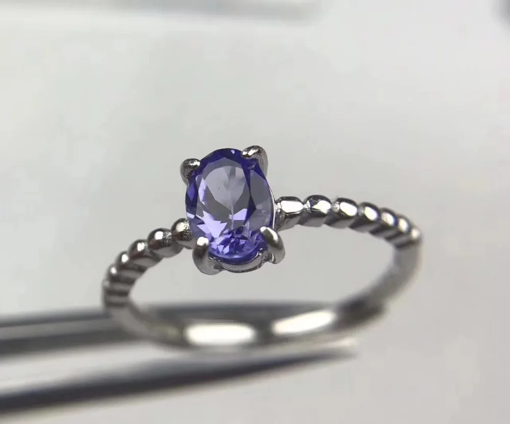 

Кольцо женское из серебра 925 пробы, с натуральным голубым танзанитом