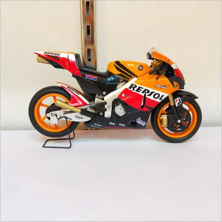 GP трек версия мотоцикла Тяньцзинь модель 4 литая машины RC211V HONDA2006 оранжевый 1/12 |