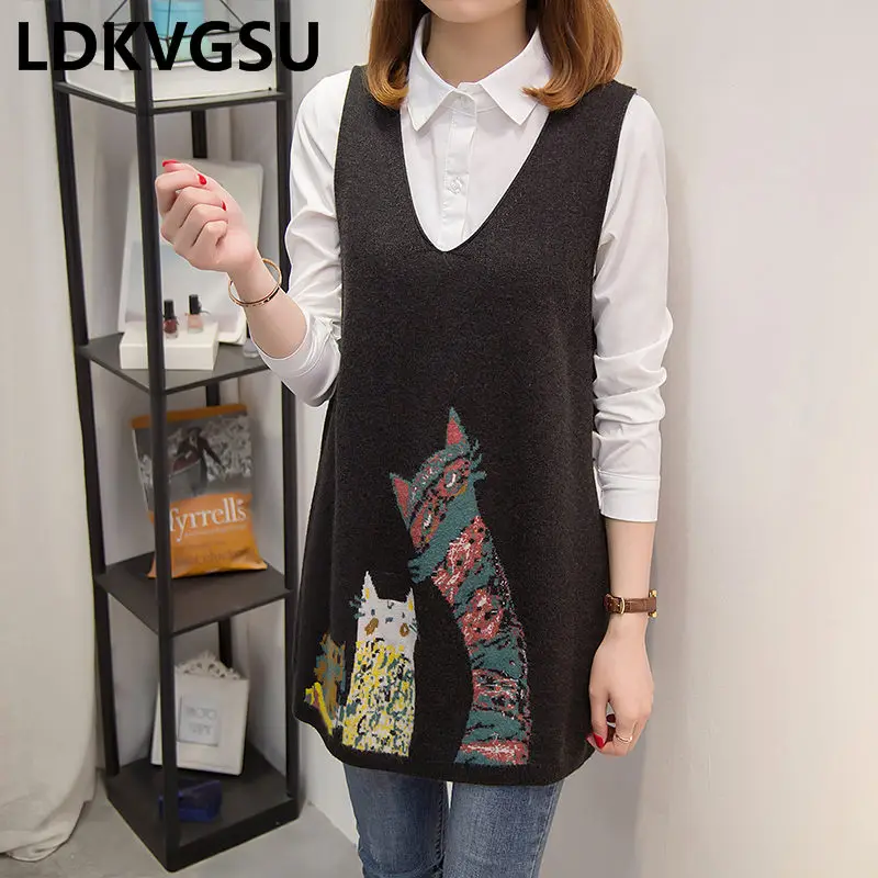 Свитер женский длинный корейский свободный без рукавов с треугольным вырезом на