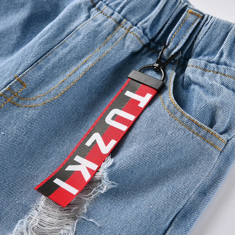 Детские джинсы для мальчиков повседневные рваные с дырками подростков на весну