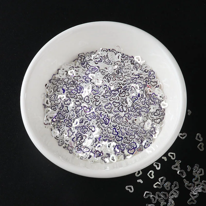 4mm Hollow Heart New10g/сумка High Flash Crystal PET блестки Звезда Сердце Луна Сакура блесток пайетки для маникюра, свадебные конфетти, аксессуары для ногтей - Цвет: 4mm Hollow Heart