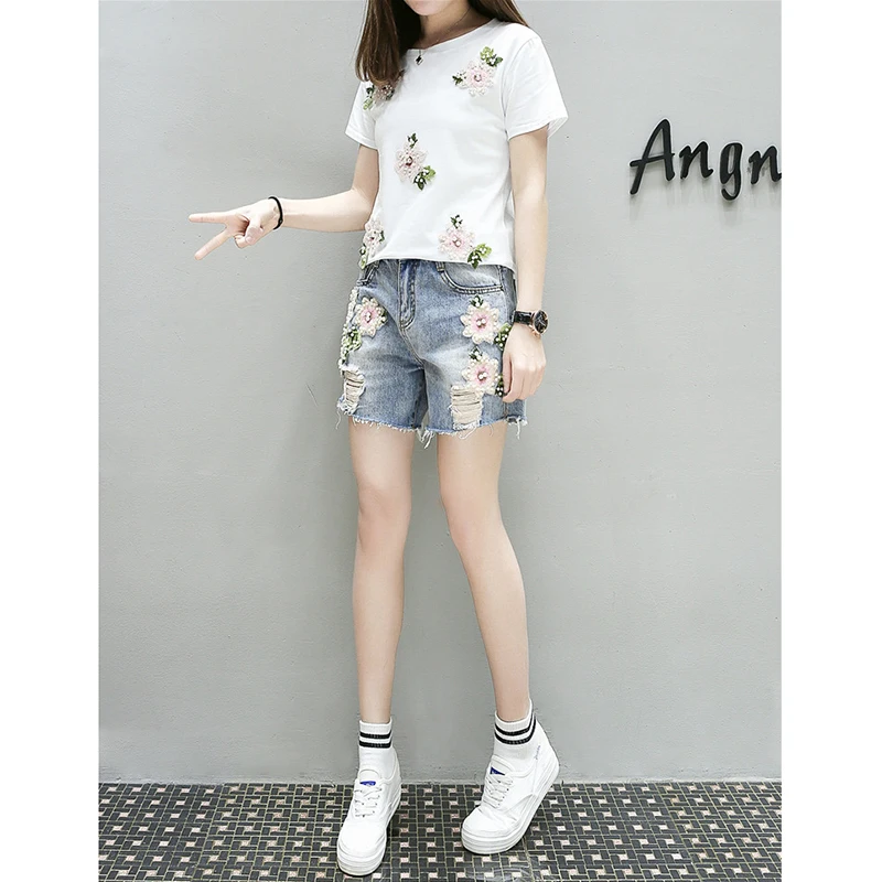 Летний джинсовый спортивный костюм женский из двух предметов модные рваные