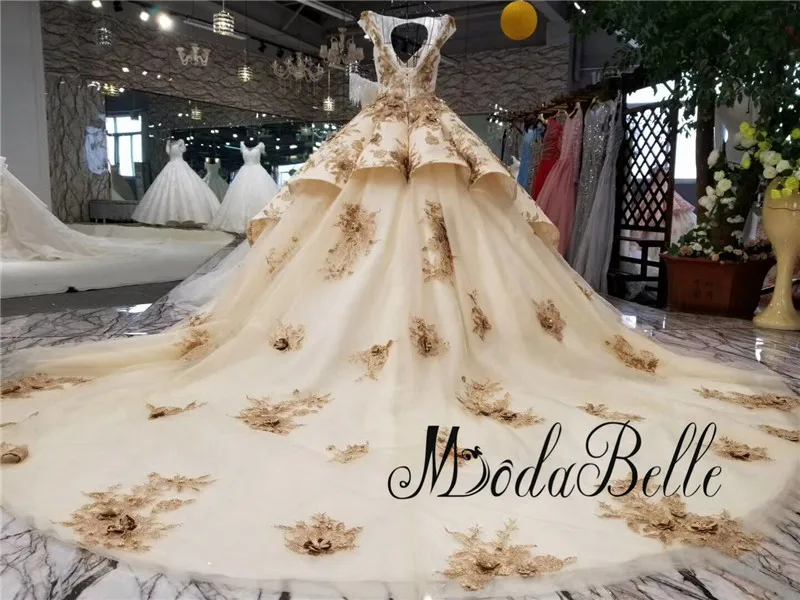 Платье для свадьбы Modabelle Deluxe цвета шампанского золотого с объемным цветком