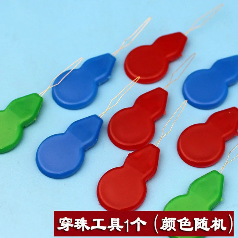 

Plastic gourd-shaped bead piercing tool hand head three-way device