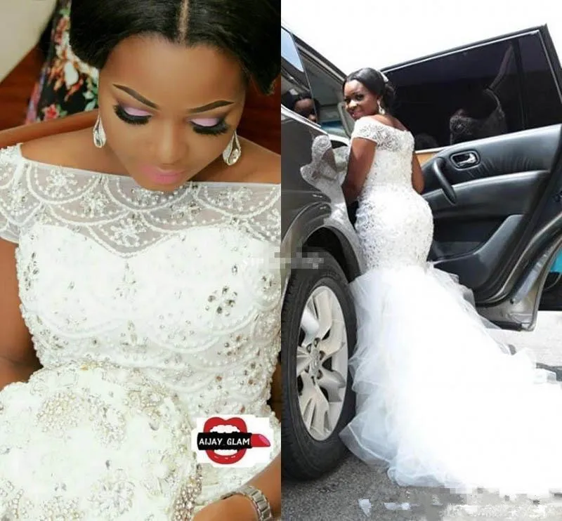 

Plus Size Arabic Nigerian Wedding Dresses Mermaid Luxury Beading Pearls Sheer Bateau Neck Short Sleeves Chapel Train Bridal