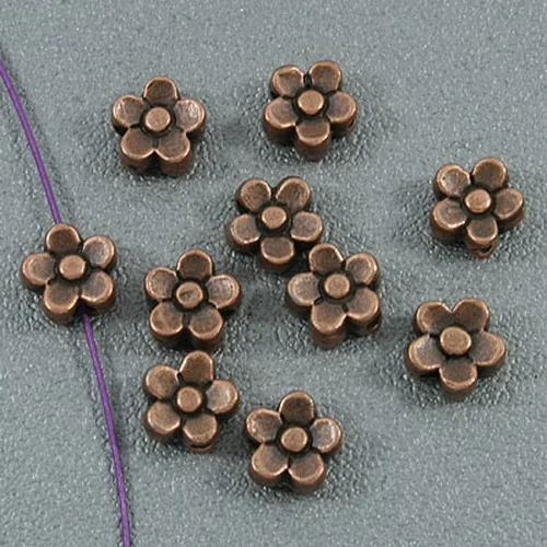 

100pcs ANTIFQUED copper-tone 5.4mm plum flower spacer beads H1890