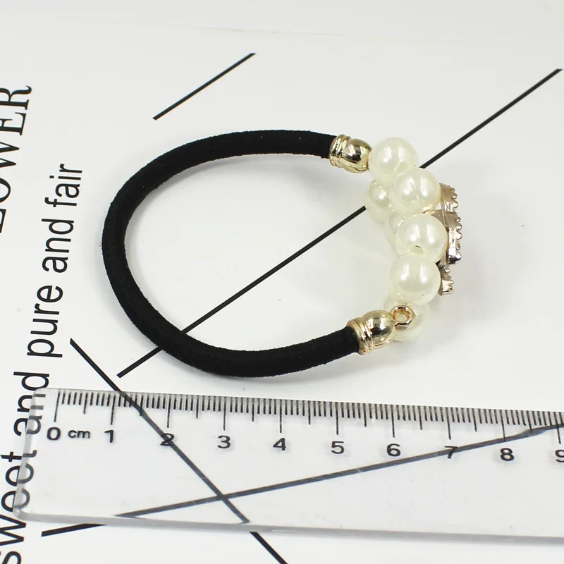 Модные для девушек и женщин выполнено из жемчуга цветка провода хвост держатель