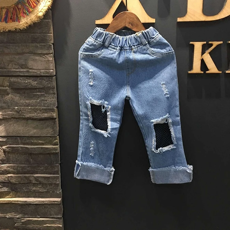 2017 весна голубой рваные джинсы для детей отверстие джинсовые брюки корейский
