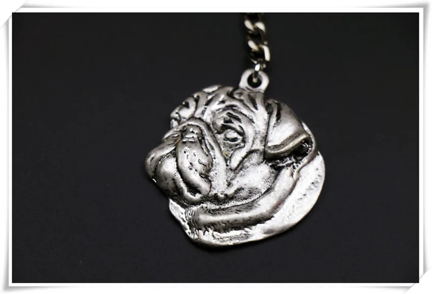 

pug Keychain jewelry Popular dog Key Chain Key Ring Embossed golden colors
