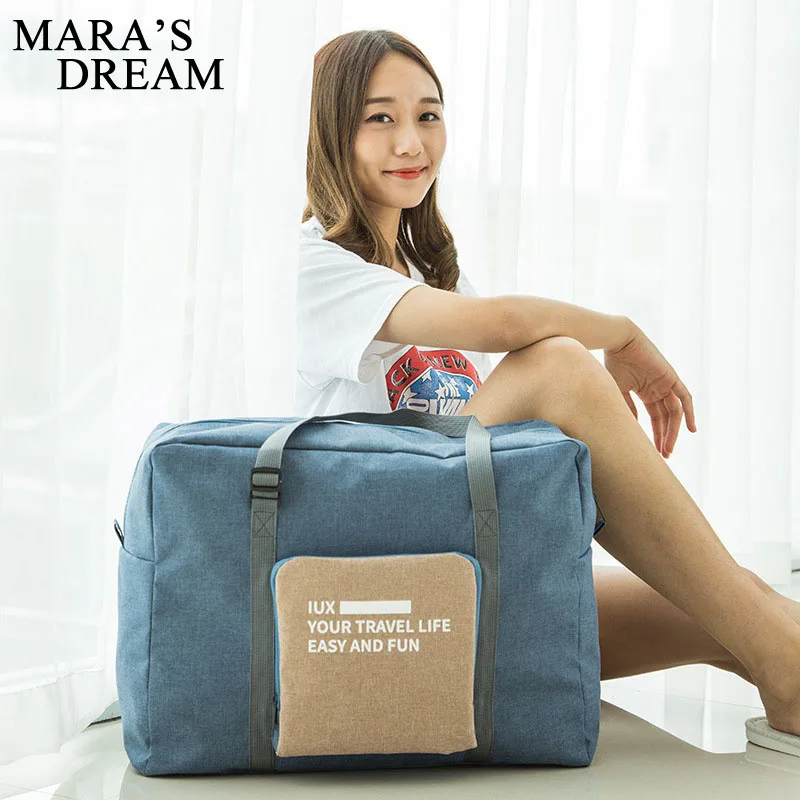 

Mara's Dream Unisex travel bag trend can fold large capacity Women canvas bag casual solid color Multifunction storage bag