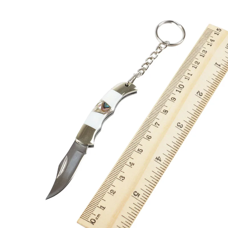 

Folding Blade Knife White Copper + Shell Handle Tactical Outdoor Camping Knives with Key Holder Tool Gift