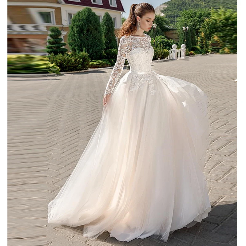 

2019 Long Sleeve Bridal Dress Illusion Bateau Lace Sweetheart Neckline Romantic A line Wedding Dress Backless Sweep Train