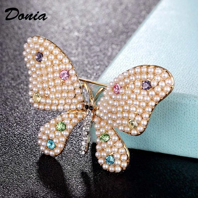 

Donia jewelry Imitation pearl butterfly needle brooch fashion scarf needle jewelry female party accessories hat and jewelry