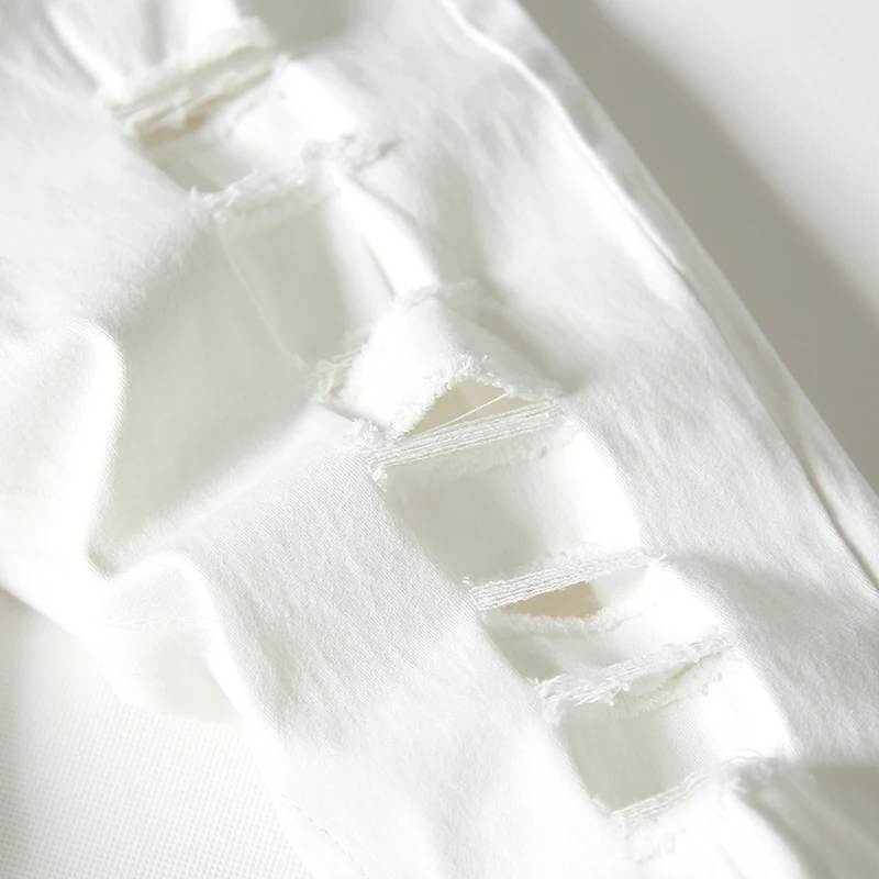 Мужские однотонные джинсы с дырками белые облегающие ковбойские брюки