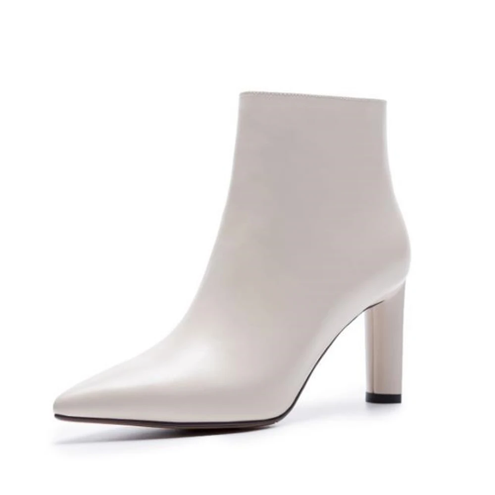 

European style Minimalist, white and white Ladies boots 2018 new autumn and winter fashion cowhide heels and sharp Martin boots.