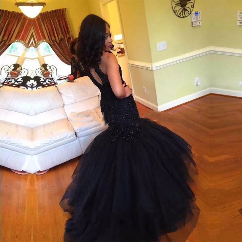 

2017 Modern Black mermaid Prom Dresses Long Sleeveless Lace Appliques Beaded Evening Party Gowns Vestido De Baile Longue