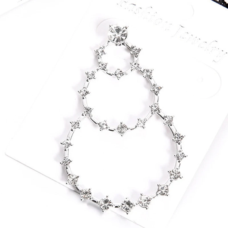 Серьги-подвески женские массивные с круглыми кристаллами