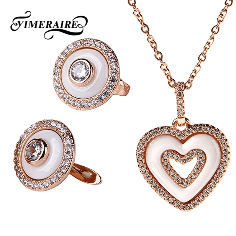 

Hollow Heart Crystal Pendant Necklace For Women With Round Elegant Stud Earrings 585 Rose Gold Color Free Chain Fashion Jewelry
