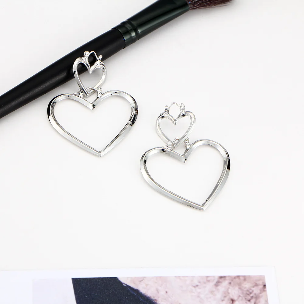 Женские серьги подвески с сердечками золотого и серебряного цвета длинные