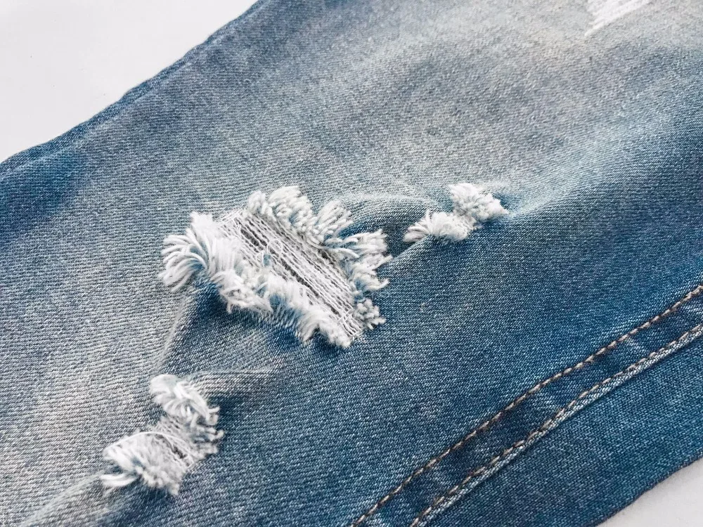 Детские джинсы с дырками облегающие эластичным поясом в Корейском стиле для