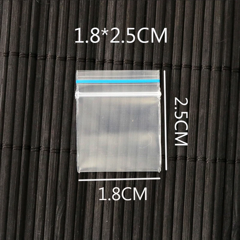 

1,8x2,5 см, оптовая продажа, 100 шт./лот, прозрачный синий краевой клапан, Герметичная сумка с замком на молнии, пластиковые подарочные пакеты для ...