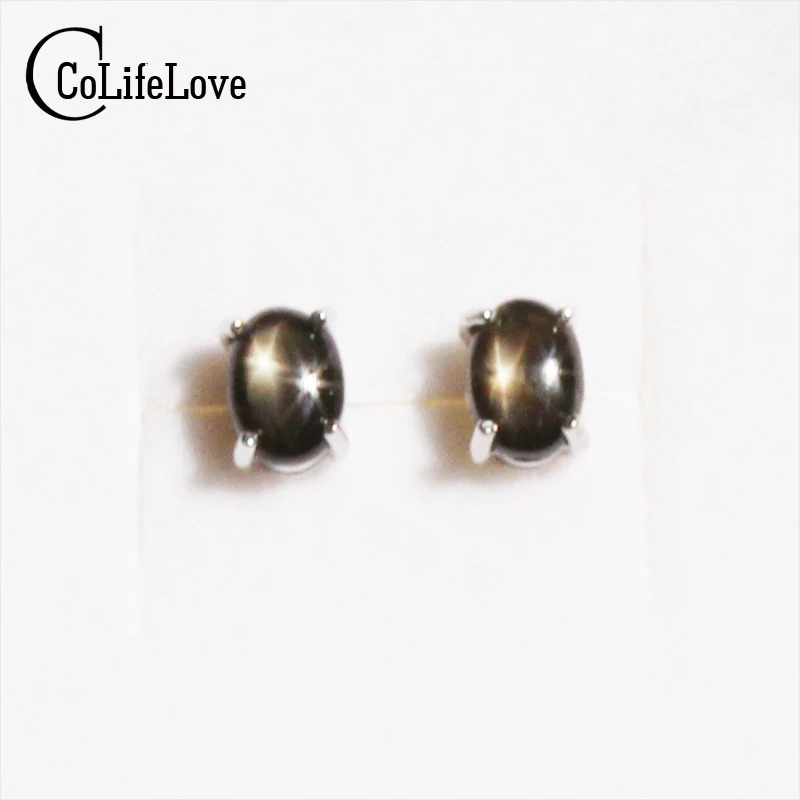 Серьги гвоздики в виде сапфира 5 х7 мм| |