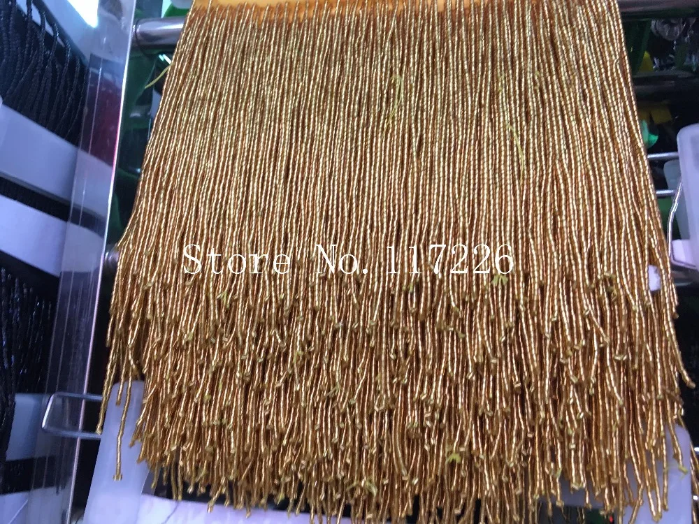 Бестселлер кружевная бейка с бахромой и кисточками длиной 15 см золотистого цвета